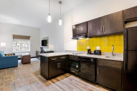 Suite, 1 King Bed with Sofa bed, Accessible, Non Smoking (Efficiency) | Desk, laptop workspace, blackout drapes, iron/ironing board