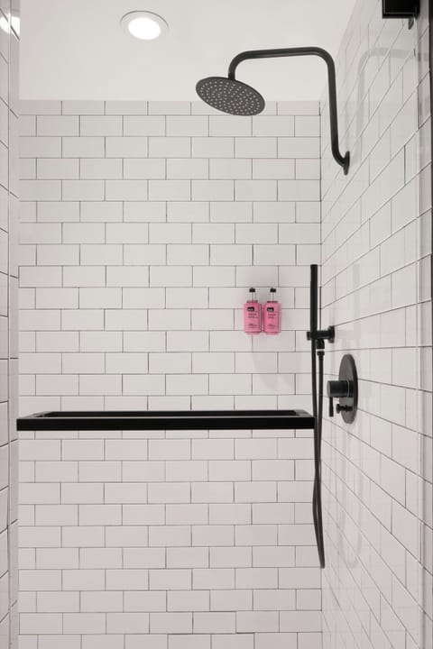 Rainfall showerhead, designer toiletries, hair dryer, towels