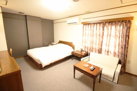 Standard Double Room | Laptop workspace, blackout drapes, iron/ironing board, free WiFi