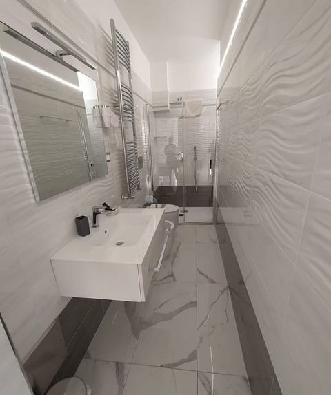 Luxury Quadruple Room | Bathroom | Slippers