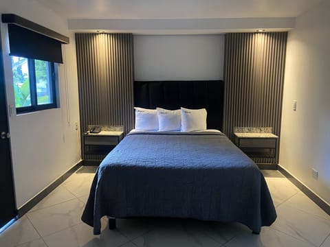 Standard Double Room, 2 Queen Beds, Private Bathroom | Iron/ironing board, free WiFi, bed sheets