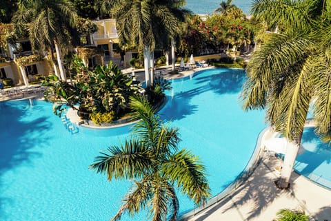 Indoor pool, outdoor pool, pool umbrellas, sun loungers