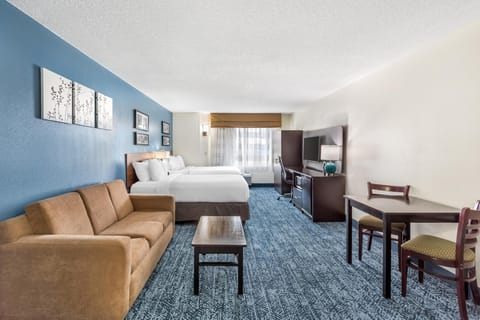 Desk, blackout drapes, iron/ironing board, free cribs/infant beds