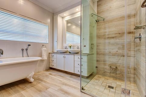 Dassen Island | Bathroom | Separate tub and shower, rainfall showerhead, free toiletries