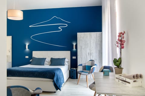 Suite, Jetted Tub (King) | Down comforters, pillowtop beds, in-room safe, individually decorated