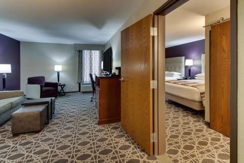 Suite, 2 Queen Beds, Accessible (Sofa Sleeper, Tub, 2 Rooms) | Desk, blackout drapes, iron/ironing board, free cribs/infant beds