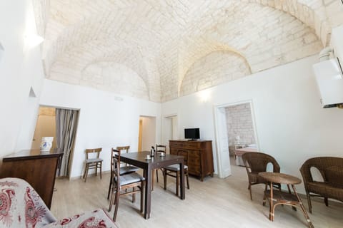 Apartment, 3 Bedrooms | Living area | Flat-screen TV