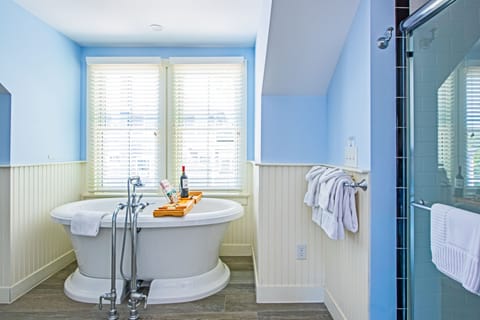 Waves Penthouse | Bathroom | Designer toiletries, hair dryer, towels, soap