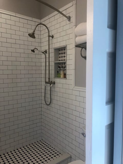 Alden 1st Floor | Bathroom | Combined shower/tub, free toiletries, hair dryer, bathrobes