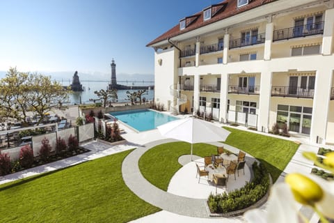 Indoor pool, seasonal outdoor pool, pool umbrellas, sun loungers