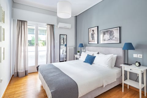 Apartment, 2 Bedrooms | Desk, laptop workspace, blackout drapes, iron/ironing board