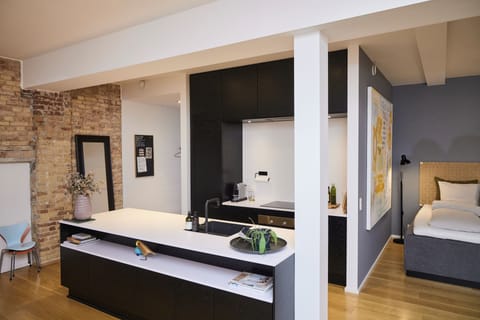 Design Studio Suite, 1 Bedroom, Non Smoking | Individually decorated, individually furnished, desk, blackout drapes