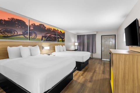 Room, 2 Queen Beds, Non Smoking | In-room safe, desk, rollaway beds, free WiFi