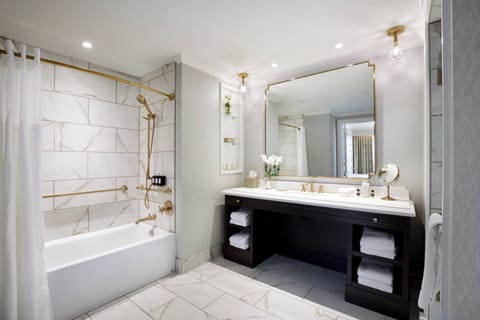 Designer toiletries, hair dryer, bathrobes, towels