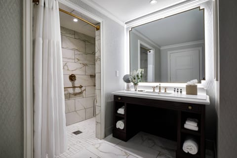 Designer toiletries, hair dryer, bathrobes, towels