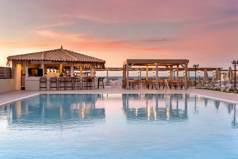 Outdoor pool, pool umbrellas, sun loungers