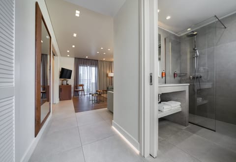 Luxury Suite, 2 Bedrooms | Bathroom | Hair dryer, towels