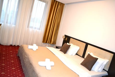 Deluxe Double Room | Premium bedding, desk, laptop workspace, iron/ironing board