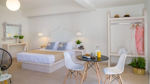 Quadruple Room | Hypo-allergenic bedding, in-room safe, desk, laptop workspace