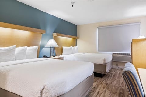 Standard Room, 2 Queen Beds | Desk, iron/ironing board, free WiFi, bed sheets