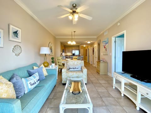 Condo, 2 Bedrooms, Balcony, Beach View (407) | Living area | Flat-screen TV