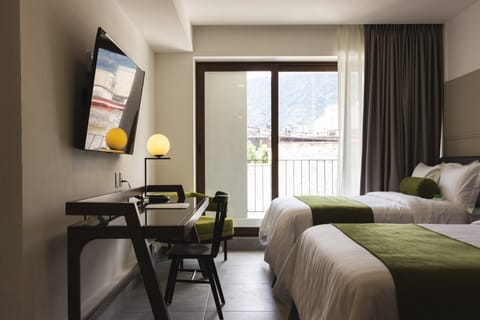 Deluxe Room, 2 Double Beds | In-room safe, iron/ironing board, free WiFi, bed sheets