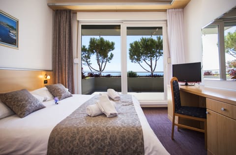 Family Suite, Terrace | Minibar, in-room safe, desk, laptop workspace