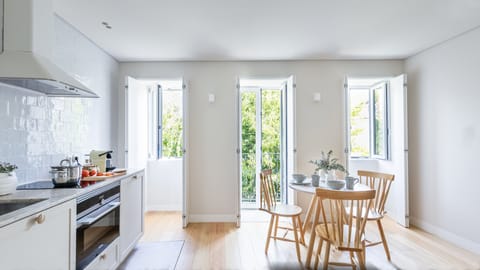 Design Apartment, 1 Bedroom, Balcony, City View (2) | Living area | 32-inch flat-screen TV with cable channels, TV