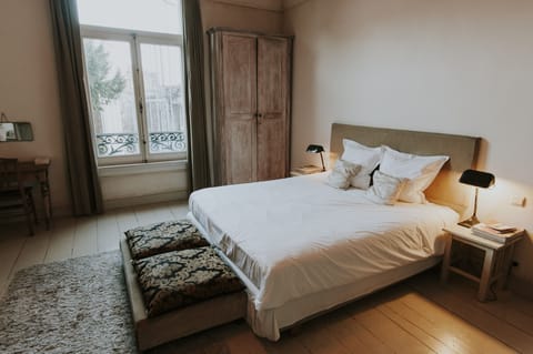 Double Room, Garden View | Minibar, in-room safe, individually decorated, individually furnished