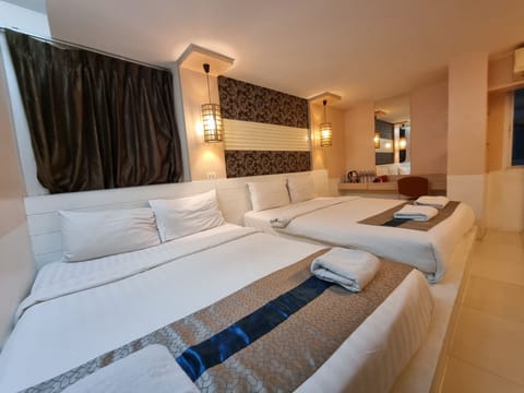Deluxe Quadruple Room, Multiple Beds | Free WiFi, bed sheets