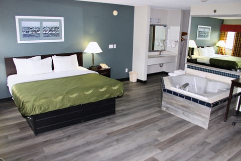 King Bed with 2 Person Jacuzzi | Premium bedding, down comforters, desk, blackout drapes