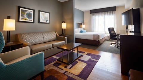 Suite, 1 King Bed, Non Smoking, Refrigerator | In-room safe, desk, laptop workspace, iron/ironing board