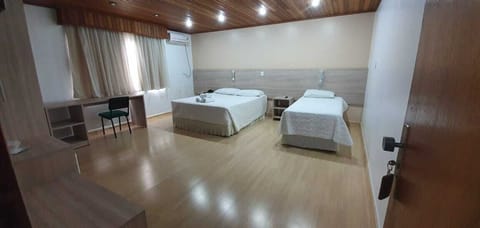 Executive Triple Room | Minibar, desk, free WiFi, bed sheets