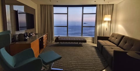 Junior Suite, Sea View | Minibar, in-room safe, individually decorated, laptop workspace