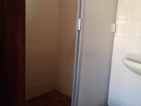 Shower, towels, soap, toilet paper