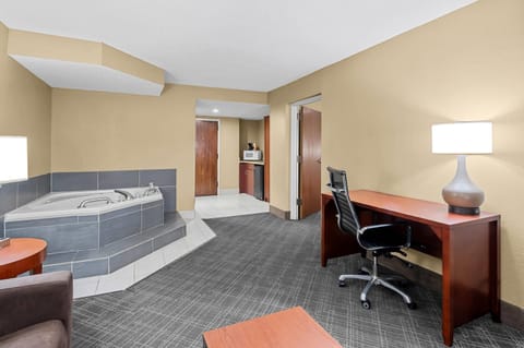 Suite, 1 King Bed, Non Smoking | In-room safe, desk, soundproofing, iron/ironing board