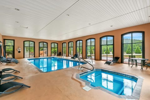 Indoor pool, open 10:00 AM to 10:00 PM, sun loungers