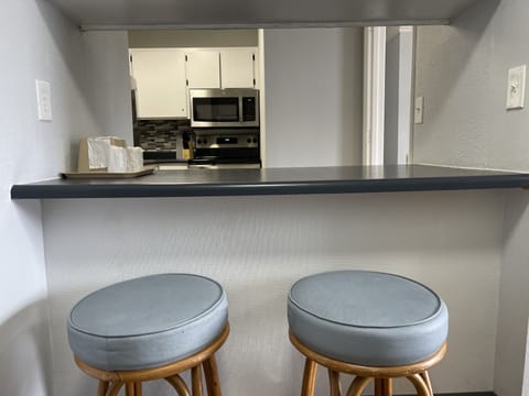 Deluxe Room, 1 Queen Bed, Kitchenette | Private kitchen | Fridge, coffee/tea maker