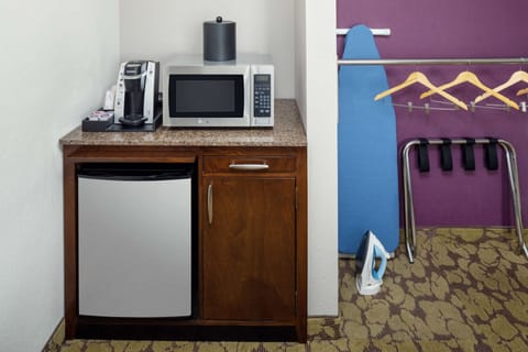 Desk, laptop workspace, blackout drapes, iron/ironing board