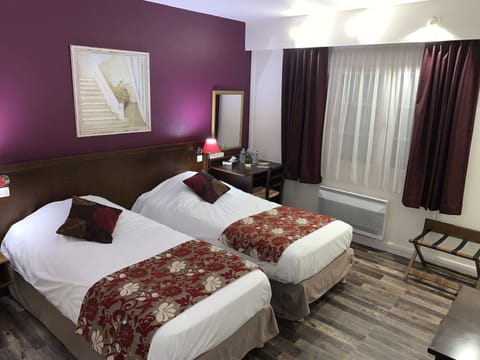 Standard Room, 2 Twin Beds | 2 bedrooms, individually decorated, individually furnished, desk