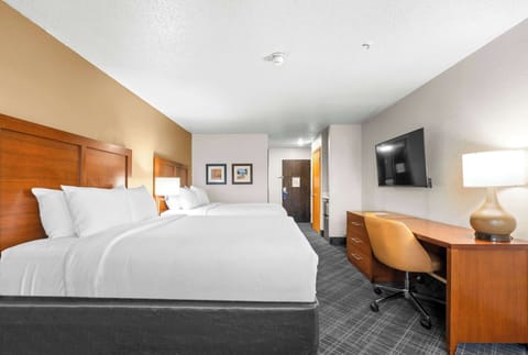 Premium bedding, pillowtop beds, desk, laptop workspace