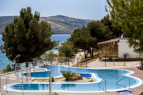 Seasonal outdoor pool, pool umbrellas, sun loungers