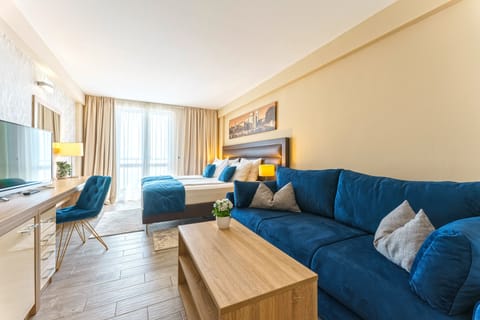 Family Room with Balcony - Sea Side | In-room safe, desk, free WiFi, bed sheets