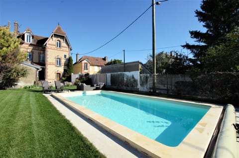 Seasonal outdoor pool, open 10:00 AM to 7:00 PM, sun loungers