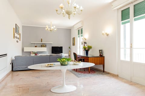Apartment, 4 Bedrooms | Living area | Flat-screen TV