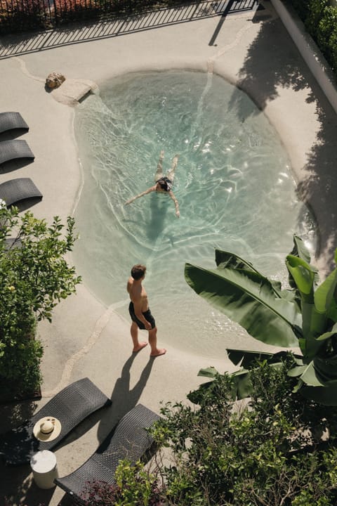 Outdoor pool, open 9:00 AM to 9:00 PM, pool umbrellas, sun loungers