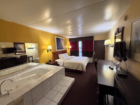 Studio Suite, 1 King Bed, Non Smoking | Desk, blackout drapes, iron/ironing board, free WiFi