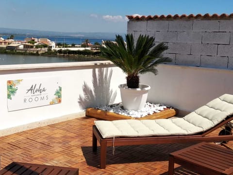 Deluxe Triple Room, Sea View | In-room safe, desk, free WiFi, bed sheets