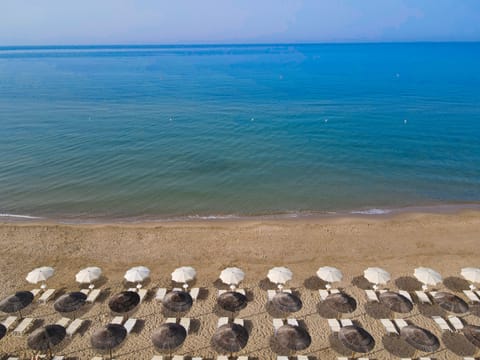 Sun loungers, beach umbrellas, beach towels