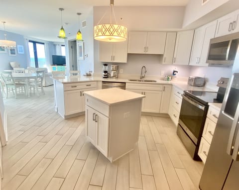 Condo, 3 Bedrooms, Balcony, Beachfront (401A) | Private kitchen | Full-size fridge, microwave, oven, stovetop